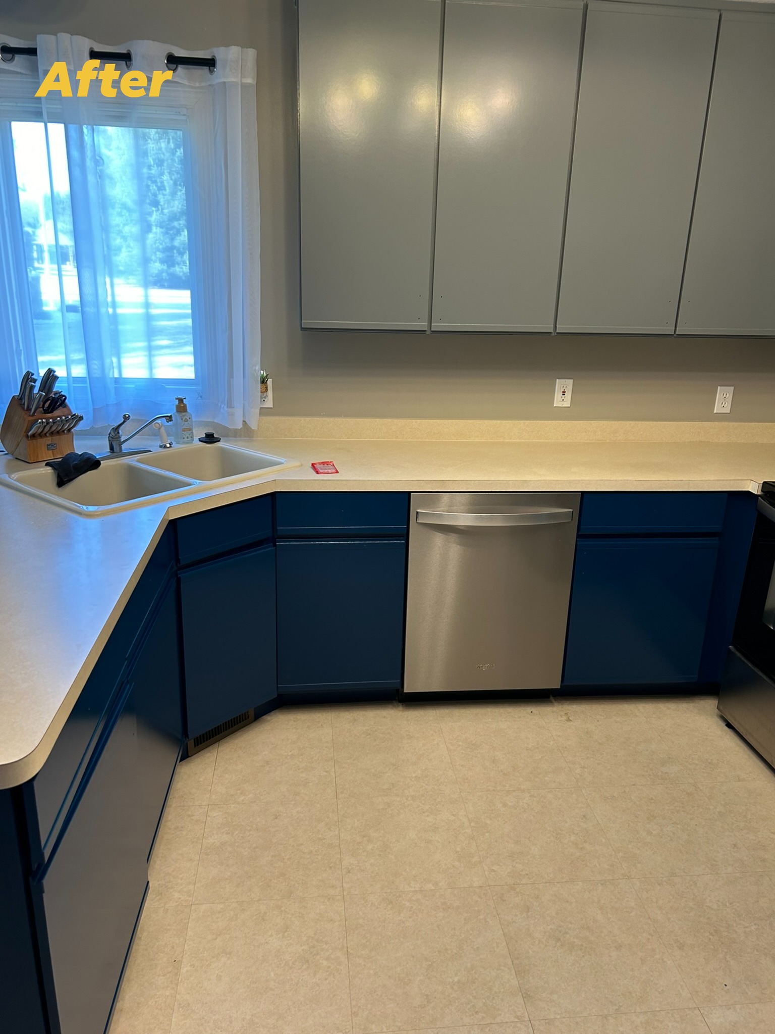 After — Kitchen cabinet repaint, navy and gray