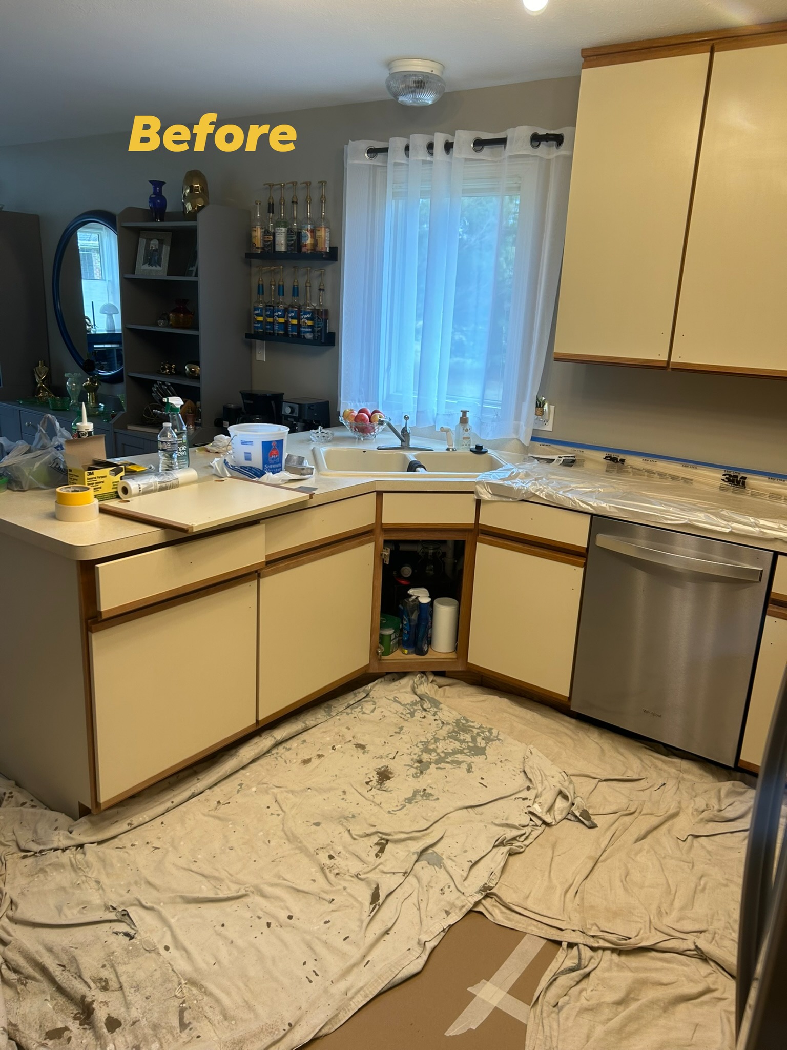 Before — Kitchen cabinet repaint, cream cabinets