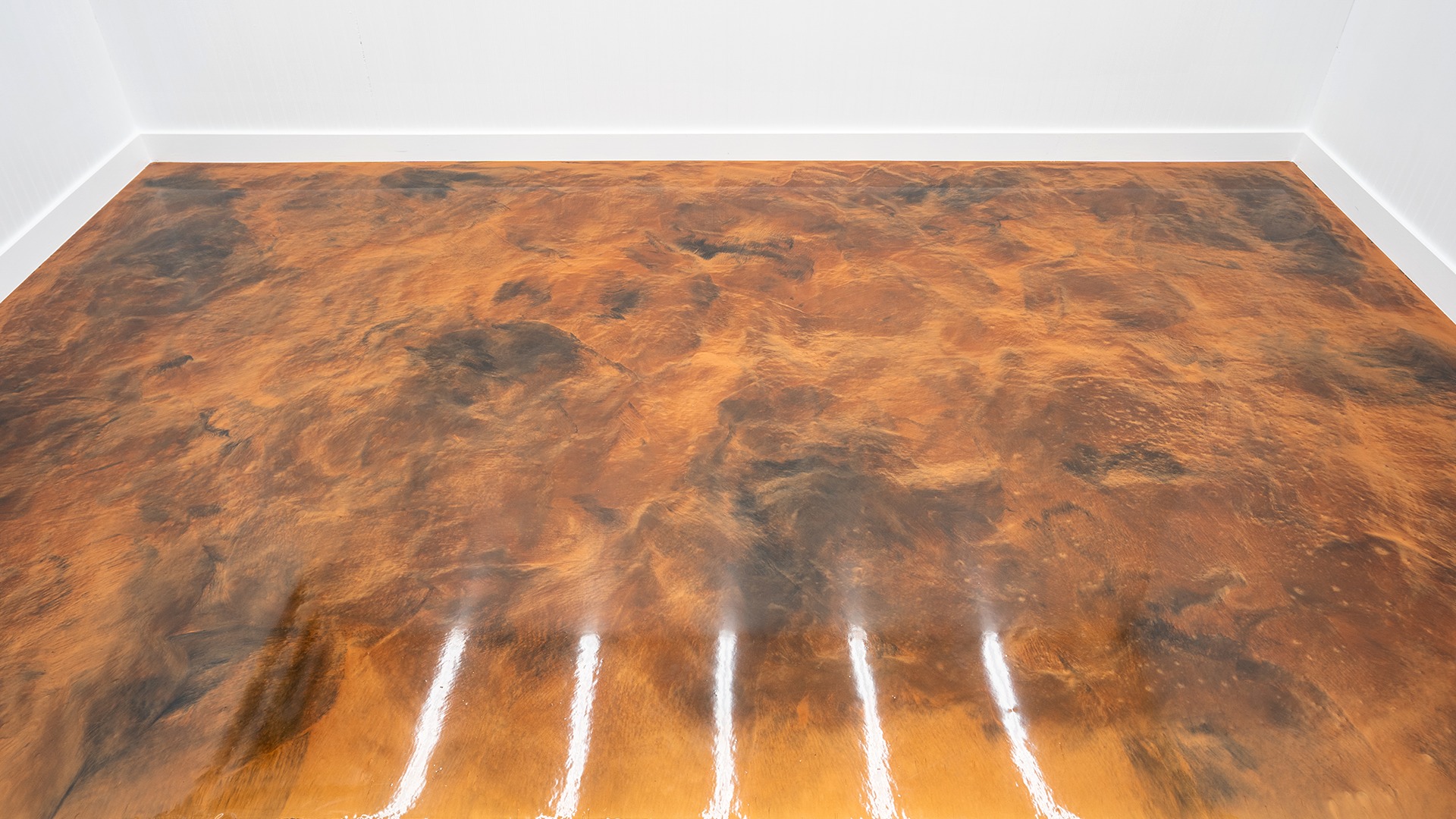 Custom floor finish in brown and copper